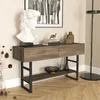 A console table with decorative items in a room setting. Náhled obrázku produktu
