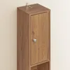 A close-up, slightly angled view of a narrow, tall wooden cabinet mounted on a wall. Náhled obrázku produktu