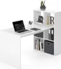 A white L-shaped desk with a built-in shelving unit, featuring a laptop, books, and decorative items. Podgląd zdjęcia produktu