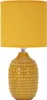 A table lamp with a textured base and a yellow fabric shade. Anteprima dell’immagine prodotto