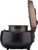 A side view of an open rice cooker with the inner pot visible. Voir les images du produit