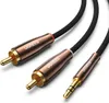 A close-up studio shot of a UGREEN audio cable with RCA and 3.5mm jack connectors. Náhled obrázku produktu