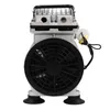 A front view of a silver and black laboratory vacuum pump with a black fan grill and rubber feet. Náhled obrázku produktu