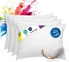 A stack of white pillows with colorful powder exploding behind them. Náhľad obrázku produktu