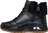 A side view of a black Skechers sneaker boot with fur trim. Produktbild-Vorschau