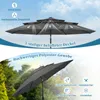 A split image showing a dark gray patio umbrella with a tiered, ventilated canopy and a second image of the same umbrella in a garden setting. Náhled obrázku produktu