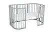 A grey crib with a white mattress on a white background. Produktbild-Vorschau