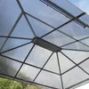 Close-up view of the roof structure of a gazebo, showing the polycarbonate panels and metal frame. Podgląd zdjęcia produktu