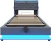 A studio shot of a bed frame with a headboard and slatted base, illuminated by blue LED lights. Produktbild-Vorschau