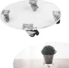 A clear acrylic plant stand with wheels is shown from above, and a small potted plant is shown on a similar stand from the side. Produktbild-Vorschau