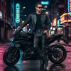 A man in leather clothing poses with a motorcycle in a neon-lit city at night. Produktbild-Vorschau