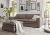 A living room scene with a sofa, ottoman, and decorative elements. Produktbild-Vorschau