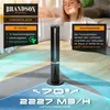 A woman is relaxing in a bright room with a tower fan in the foreground. Promotional text highlights the fan's features. Podgląd zdjęcia produktu