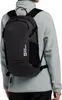A person wearing a backpack. Voir les images du produit