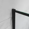 A close-up view of a black aluminum frame and green-tinted glass, likely part of a shower enclosure, against a tiled wall. Produktbild-Vorschau