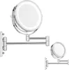 Two wall-mounted makeup mirrors with LED lights are shown against a white background. The larger mirror is in the foreground and is extended on its arm, while a smaller mirror is in the background, also extended. Náhled obrázku produktu