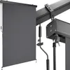 A close-up view of a gray vertical awning being attached to a dark gray metal beam. Náhled obrázku produktu
