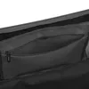 A close-up view of the interior of a black travel bag, showing a zippered pocket with a checkered lining. Produktbild-Vorschau