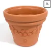 A terracotta flower pot with decorative floral patterns. Anteprima dell’immagine prodotto