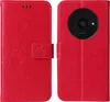 A red flip phone case with floral embossing is shown from the front and back. Produktbild-Vorschau