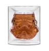 A glass with a stormtrooper helmet design filled with a brown liquid. Anteprima dell’immagine prodotto