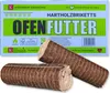 A cardboard box of wood briquettes with two briquettes in the foreground. Produktbild-Vorschau