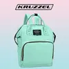 Kruzzel 8913 Dámský městský batoh 2v1 mátová Náhled obrázku produktu 12