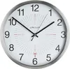 A close-up studio shot of a silver-framed wall clock with a white face and black numbers and hands. Produktbild-Vorschau