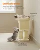 Two cats interacting with a cat tree in a room. Produktbild-Vorschau