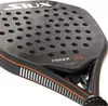 Close-up of a black and orange padel racket. Produktbild-Vorschau
