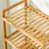 Close-up view of a wooden shelf unit, likely a laundry rack or storage shelf. Produktbild-Vorschau