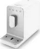 A white SMEG coffee machine with silver accents is shown against a white background. Voir les images du produit