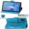 A blue leather phone case with a butterfly embossed design, shown open and closed, with a phone inserted in the open view. Produktbild-Vorschau