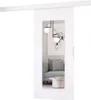 A sliding door with a mirror is shown in a room with a sofa and a coffee table. Produktbild-Vorschau