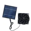 A black solar-powered fan and a blue solar panel on a white background. Voir les images du produit