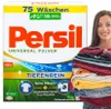 A box of Persil Universal Pulver laundry detergent is shown next to a woman holding a stack of clean laundry. Produktbild-Vorschau