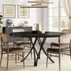A dining room setting with a round table and chairs, artwork on the wall, and a window with curtains. Anteprima dell’immagine prodotto