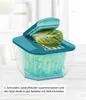 A salad spinner with a head of lettuce being prepared for chopping. Produktbild-Vorschau