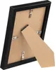 The back of a black picture frame with a kickstand. Anteprima dell’immagine prodotto