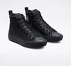 A pair of black high-top Converse sneakers. Produktbild-Vorschau