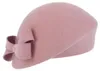 Fiebig schicker asymmetrischer Pillbox-Filzhut mit Schleife in lila