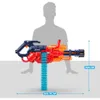 A silhouette of a person is shown behind a toy blaster, with dimensions indicated. Produktbild-Vorschau