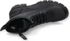 A black leather boot is shown from a top-down perspective, with the laces partially undone and the side zipper open. Produktbild-Vorschau