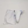A baby nasal aspirator and its storage bag are placed on a white surface. Anteprima dell’immagine prodotto