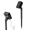Two solar powered garden lights with stakes, shown from different angles. Anteprima dell’immagine prodotto