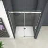 A modern bathroom shower enclosure with sliding glass doors. Produktbild-Vorschau