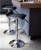 Two black bar stools with chrome bases are shown in front of a kitchen island. Anteprima dell’immagine prodotto