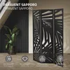 A black, three-panel room divider with a leaf-like cut-out pattern is shown in a room setting with a plant and wooden floor. Icons and text describing features are present at the bottom. Náhled obrázku produktu