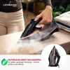 A person is ironing clothes with a steam iron, with a stack of folded clothes in the background. Produktbild-Vorschau