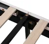 A close-up view of the internal structure of a bed frame, showing wooden slats and metal supports. Produktbild-Vorschau